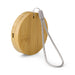 Reveal Circle Wireless Charger Set - A round bamboo wireless charger with a grey strap, featuring a small port for connection.