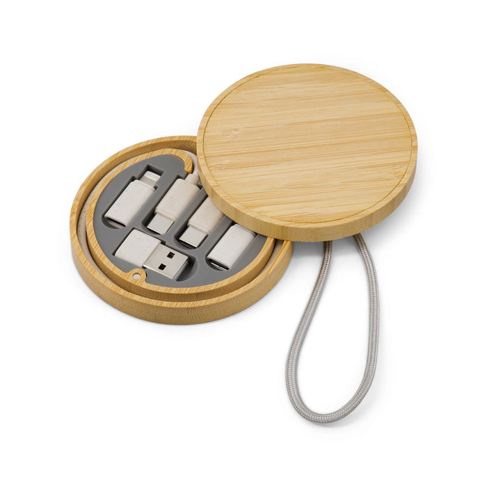 Reveal Circle Wireless Charger Set - A round wooden box with a lid contains multiple USB connectors in a grey insert. The box has a handle for easy carrying.