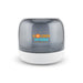 Dazzle RGB Speaker - A compact speaker featuring a grey translucent cover and a white base, with branding on the front.