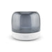 Dazzle RGB Speaker - A Dazzle RGB Speaker with a sleek grey transparent body and a white base, featuring a brand logo.
