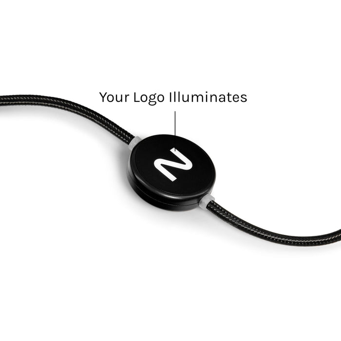 Aura by Nomis Cable - A black illuminated charging cable featuring a round connector and a decorative braided design.