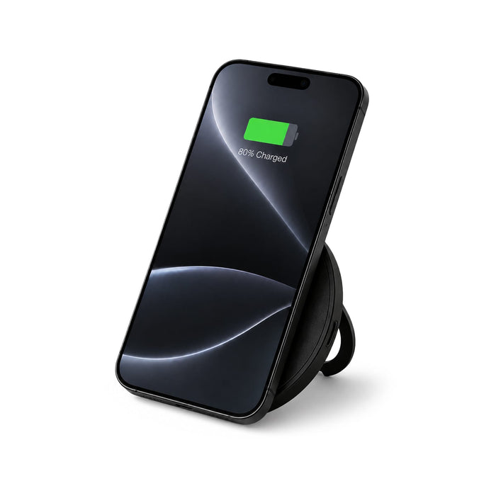 Puck Magnetic Phone and Watch Charger with Stand - A black magnetic phone and watch charger with stand, featuring a sleek design and a phone displaying a charging status.
