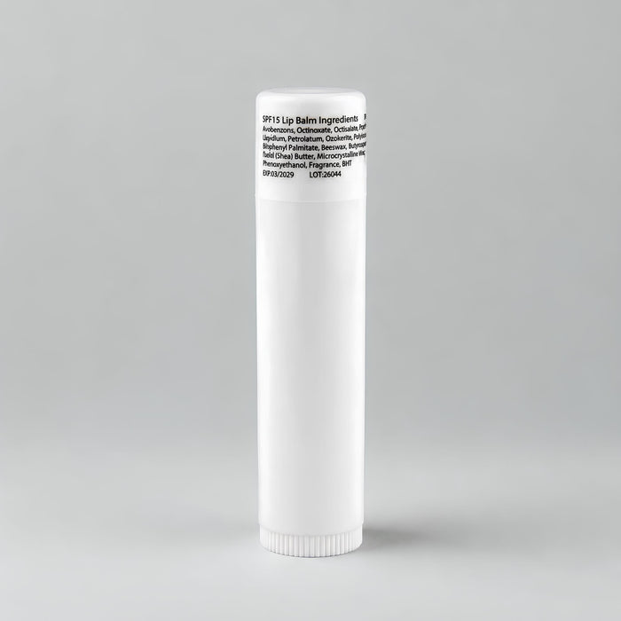Flavoured Lip Balm SPF - A white lip balm tube with a rounded cap, featuring ingredient information on the label.