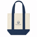 Mini Canvas Tote - A mini canvas tote in cream and navy blue, featuring a logo on the front and sturdy handles.