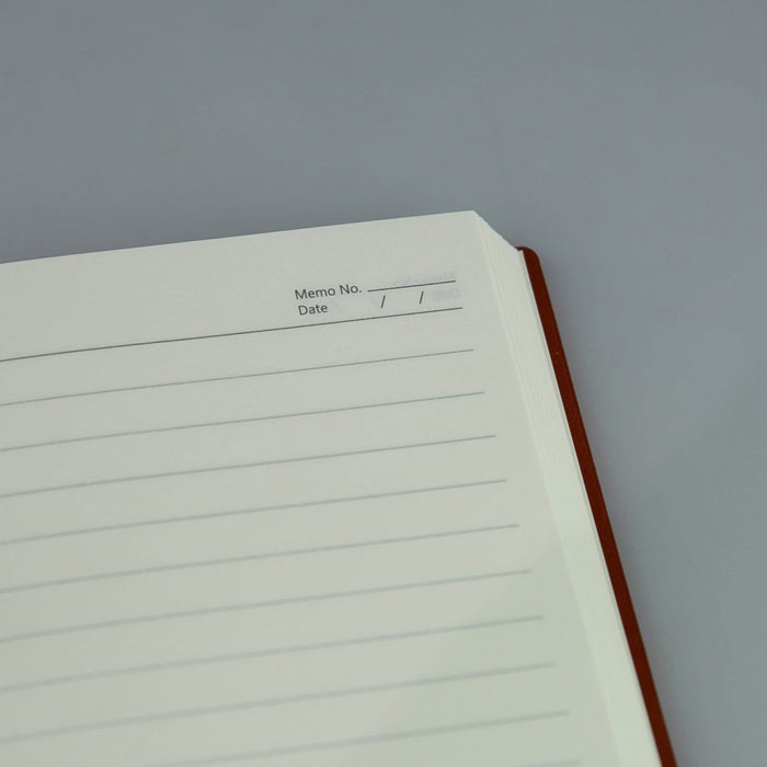 Vienna Notebook A5 - A brown A5 notebook with lined pages and a space for memo number and date at the top.