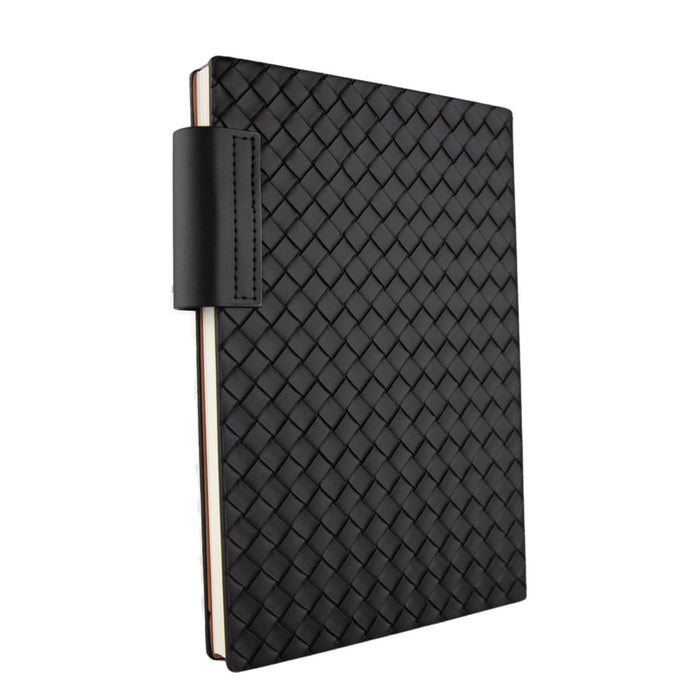Nexus Notebook - A black, woven-textured Nexus Notebook with a strap closure, featuring a plain cover and a branding logo.