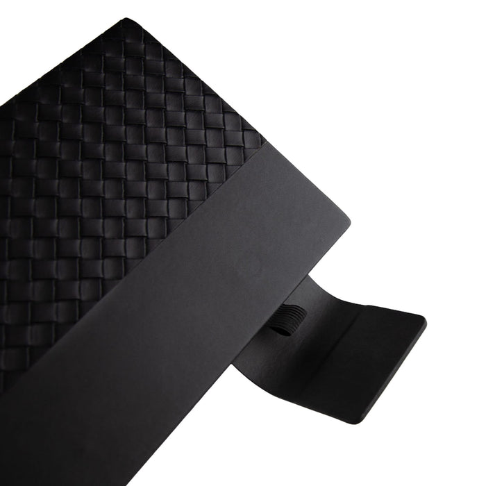 Nexus Notebook - A black Nexus Notebook featuring a textured woven cover and a black elastic band for closure.