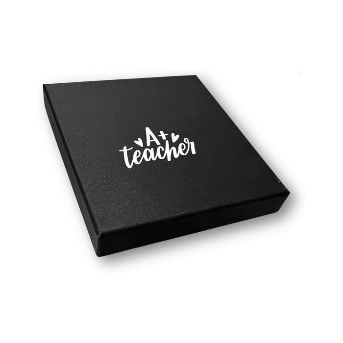 Notebook Gift Set Box - A black gift box with a logo on the top, designed for a notebook gift set.