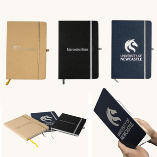 Discovery A5 Notebook - Three A5 notebooks in various colours: brown, black, and dark blue, each featuring a logo.