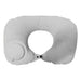 Jodie Inflatable Neck Pillow - A white inflatable neck pillow with a central opening and a valve for inflation. It has a smooth, textured surface.