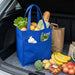 Pocket Shopping Bag - A blue shopping bag filled with lettuce, apples, bread, vegetables, and other groceries in a car boot.
