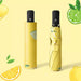 Full Colour Poppins Umbrella - A yellow umbrella with a lemon and lime design, featuring a black handle and a matching storage sleeve.