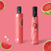 Full Colour Poppins Umbrella - A full colour umbrella featuring a watermelon print, with a matching protective cover in a pink hue.