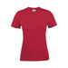 Women's Printer 140 Tee - A women's red t-shirt with a round neckline and short sleeves. It features a logo on the tag.