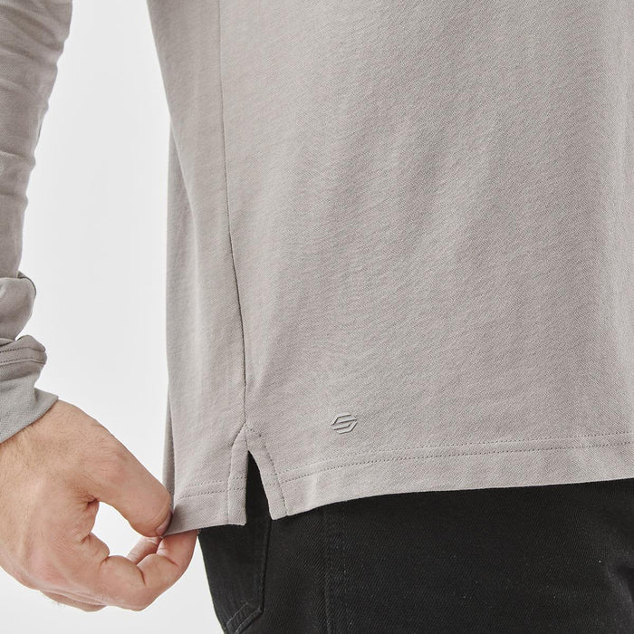 Men's Nevada L/S Micro Pique Polo - A grey long-sleeve polo shirt with a side slit, featuring a small logo near the hem.