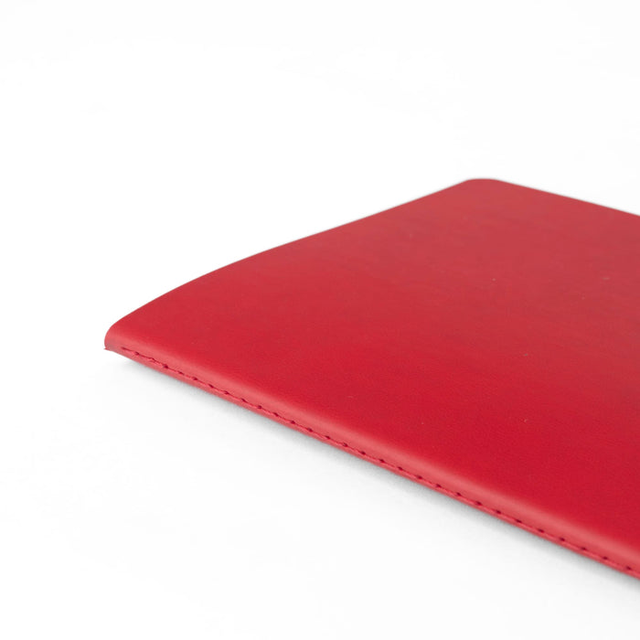 A5 Thin PU Cover Notebook - A5 thin notebook with a smooth red PU cover, featuring clean stitching along the edges and a subtle logo.