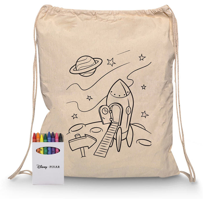 Squiggle Calico Drawstring Bag + Crayon set - A cream drawstring bag featuring a rocket ship design, accompanied by a crayon set in various colours.