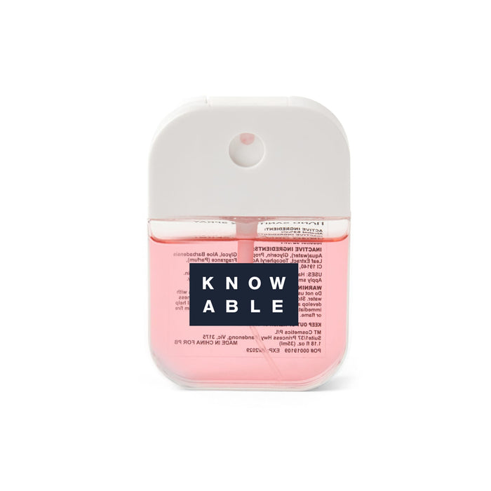 Scented 35ml Spray Sanitiser - A pink 35ml spray sanitiser in a clear container with a white lid, featuring a logo on the front.