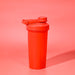 Power 600ml Shaker Cup - A drink bottle in vibrant red, featuring a screw-on lid and a flip-top cap, with a logo.