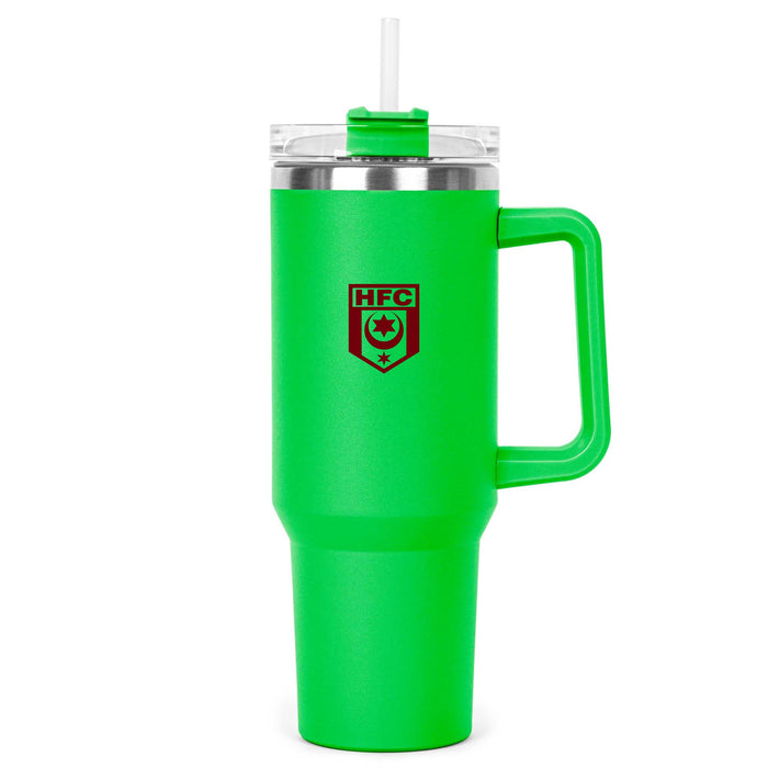 The Hippo 1.2L Mug - A drink bottle in vibrant green with a clear lid, straw, and a handle. It features a logo on the front.