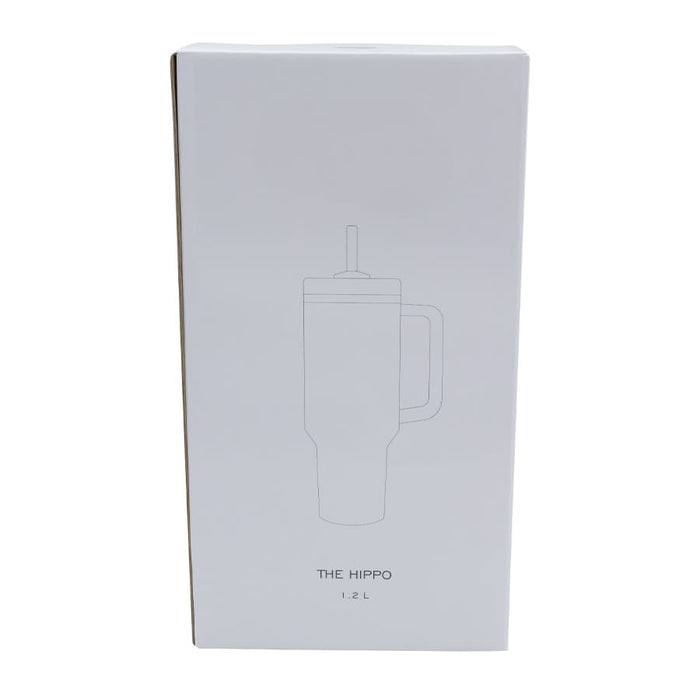 The Hippo 1.2L Mug - A drink bottle in a white box, featuring a minimalistic design and a handle. It has a logo on the packaging.