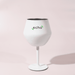 Shiraz Detachable Wine Glass - A white Shiraz detachable wine glass with a black interior and a stand, featuring a logo.