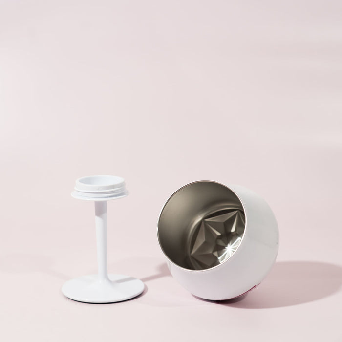 Shiraz Detachable Wine Glass - A white Shiraz detachable wine glass, featuring a removable stem and a metallic interior, set against a pale background.