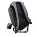 Swissdigital Bolt Anti-Theft Backpack - A grey anti-theft backpack with adjustable straps, featuring a charging port and a smartphone beside it.