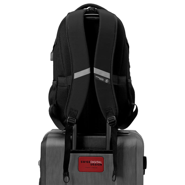 Swissdigital Vector Backpack - A black Swissdigital Vector Backpack with padded straps, positioned on top of a suitcase, featuring a logo.