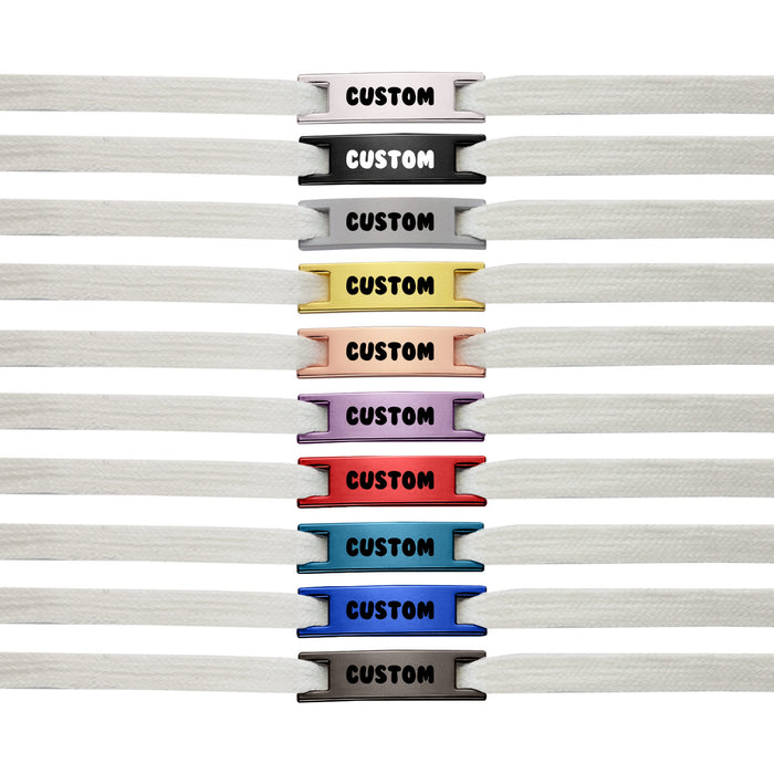 Luxury Shoelace Charms - A row of white shoelaces with various coloured charms, featuring a logo and the word "CUSTOM" on each charm.