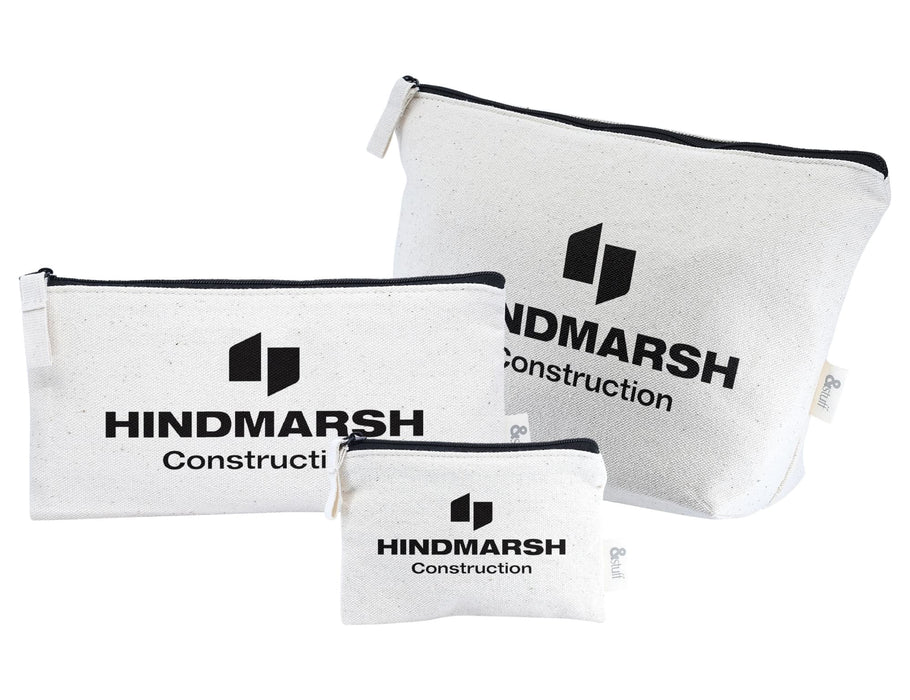 Calico Travel Set - A set of three white bags with black zippers and a logo, varying in size.