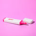 Eco Highlighter - A pink eco-friendly highlighter with a white speckled casing and a removable cap, featuring a logo.
