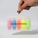Mackie Highlighter Sets - A set of five highlighters in pink, orange, blue, green, and yellow, contained in a transparent plastic case with a handle.