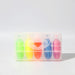 Mackie Highlighter Sets - A set of highlighters in green, yellow, pink, and blue, contained in a clear plastic case with a handle.