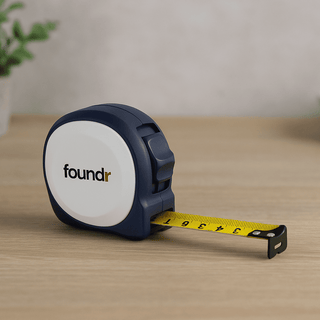 Marloo 7.5M Tape Measure - A navy tape measure with a white casing and yellow measurement tape extended, featuring a logo.