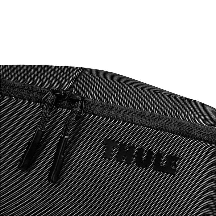 Thule Subterra 2 Toiletry Bag w/ Removable Pouch - A black toiletry bag with a textured surface, featuring a zip closure and a logo.