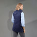 Women's Telluride Lightweight Packable Insulated Puffer Vest - A women's insulated puffer vest in navy, featuring a lightweight, packable design and a branded logo.