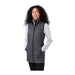 Women's Telluride Lightweight Packable Insulated Puffer Vest - A lightweight packable insulated puffer vest in grey, featuring a high collar and pockets, worn with a grey long-sleeve top.