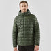 Men's Tundra Thermal Jacket - A man wearing a green puffer jacket with a hood, featuring a quilted design. The jacket has a logo on it.