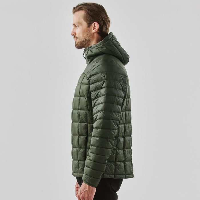 Men's Tundra Thermal Jacket - A men's puffer jacket in dark green with a hood, featuring a quilted design and a subtle logo.