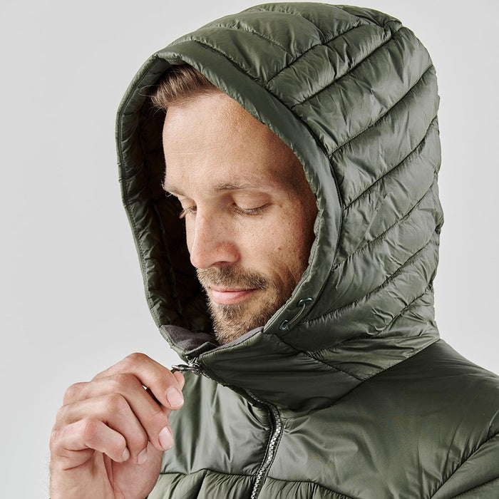 Men's Tundra Thermal Jacket - A puffer jacket in olive green with a hood, featuring quilted detailing and a zipped closure.