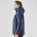 Men's Cascadia Thermal Jacket - A men's thermal puffer jacket in navy, featuring a hood and a branded logo, displayed on a model in profile.
