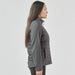 Women's Appalachian Thermal Softshell Jacket - A women's softshell jacket in grey, featuring a quilted design and a zip closure. The jacket includes a logo.