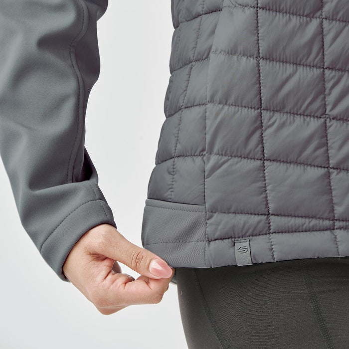 Women's Appalachian Thermal Softshell Jacket - A grey women's thermal softshell jacket featuring a quilted design and a logo at the hem.