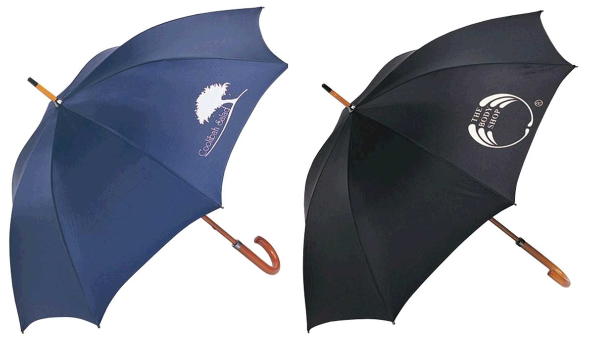 Executive Umbrella 24" - Two umbrellas are displayed, one in navy blue with a logo and the other in black with a logo, both featuring a curved handle.