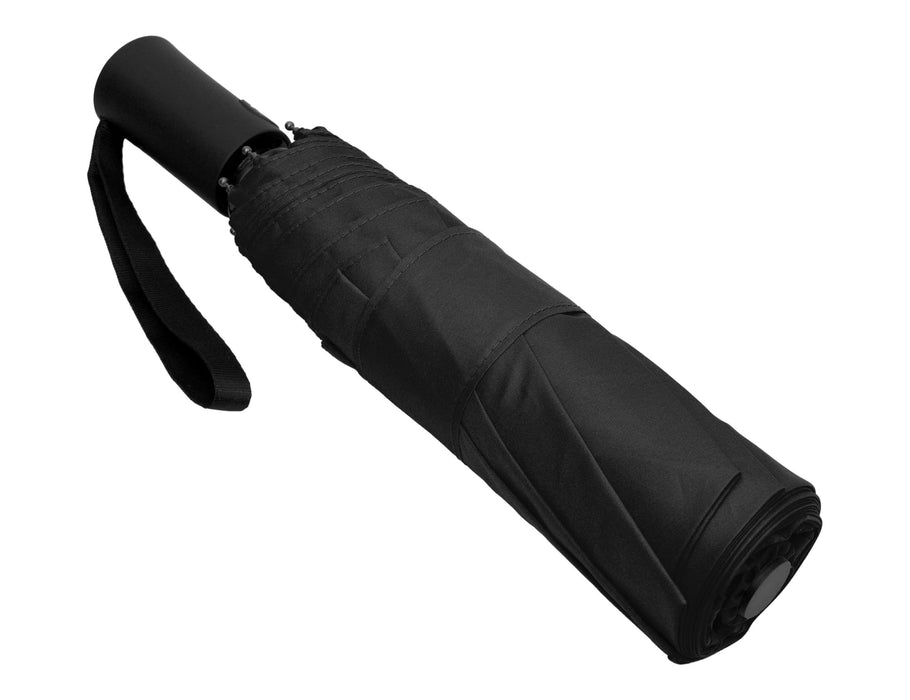 Como Fold-Up Umbrella - A black fold-up umbrella with a compact design, featuring a strap and a logo on the handle.