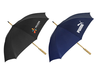 Urban 24" RPET Umbrella - A black and a navy RPET umbrella with wooden handles, each featuring a logo.