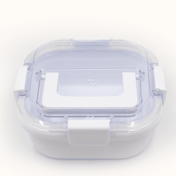 Pac-Man Lunch Box with Handle - A white and clear lunch box with a secure lid and clip fasteners, designed for food storage.