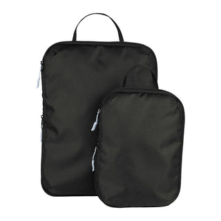 Wander & Roam Compression Packing Cube Set - A set of black compression packing cubes in two sizes with zippers and handles. Features a logo.